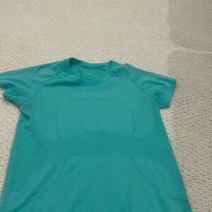 Emerald green Lululemon swiftly tech athletic shirt